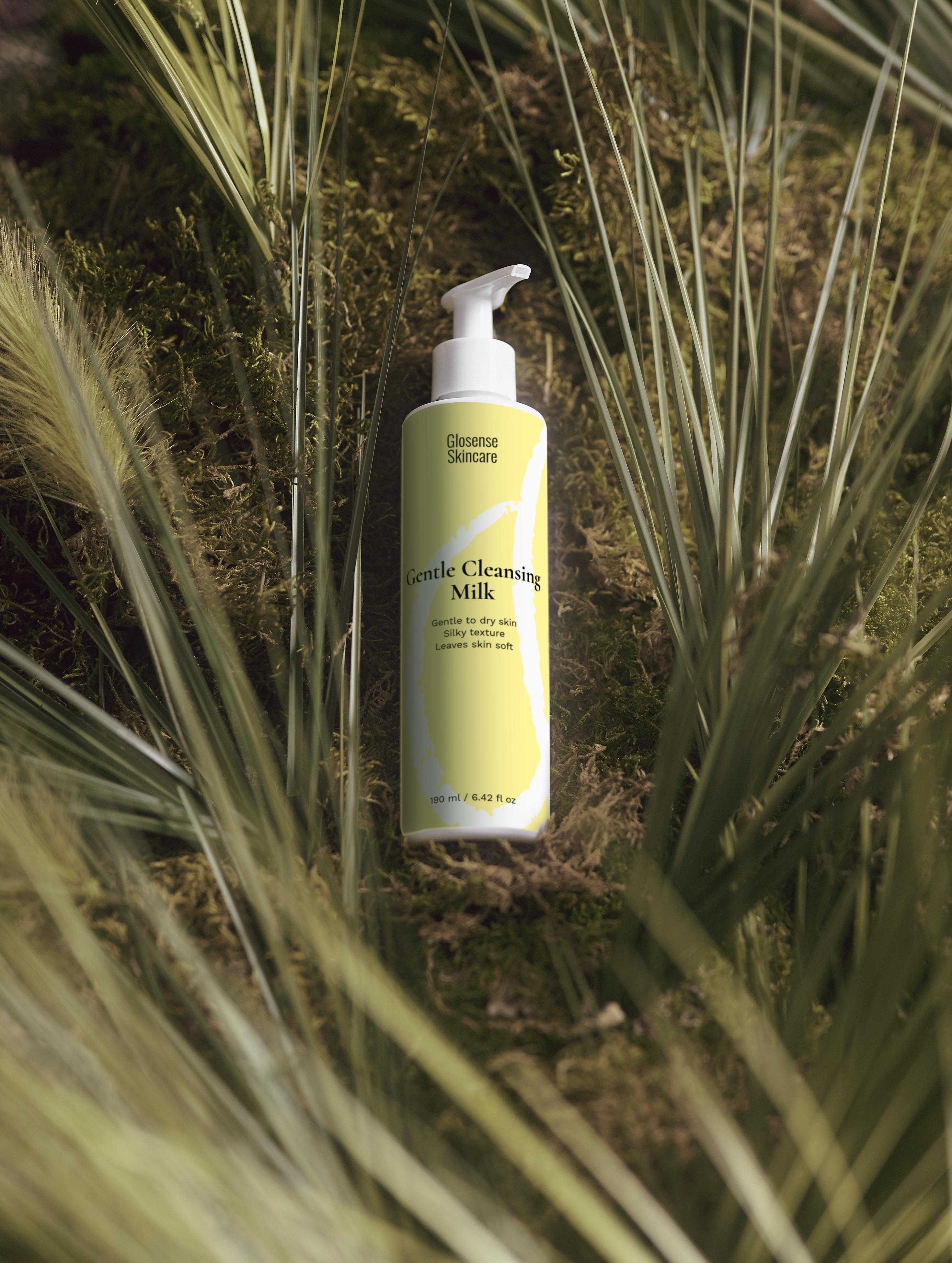 Gentle Cleansing Milk with nourishing oils on moss and grasses.